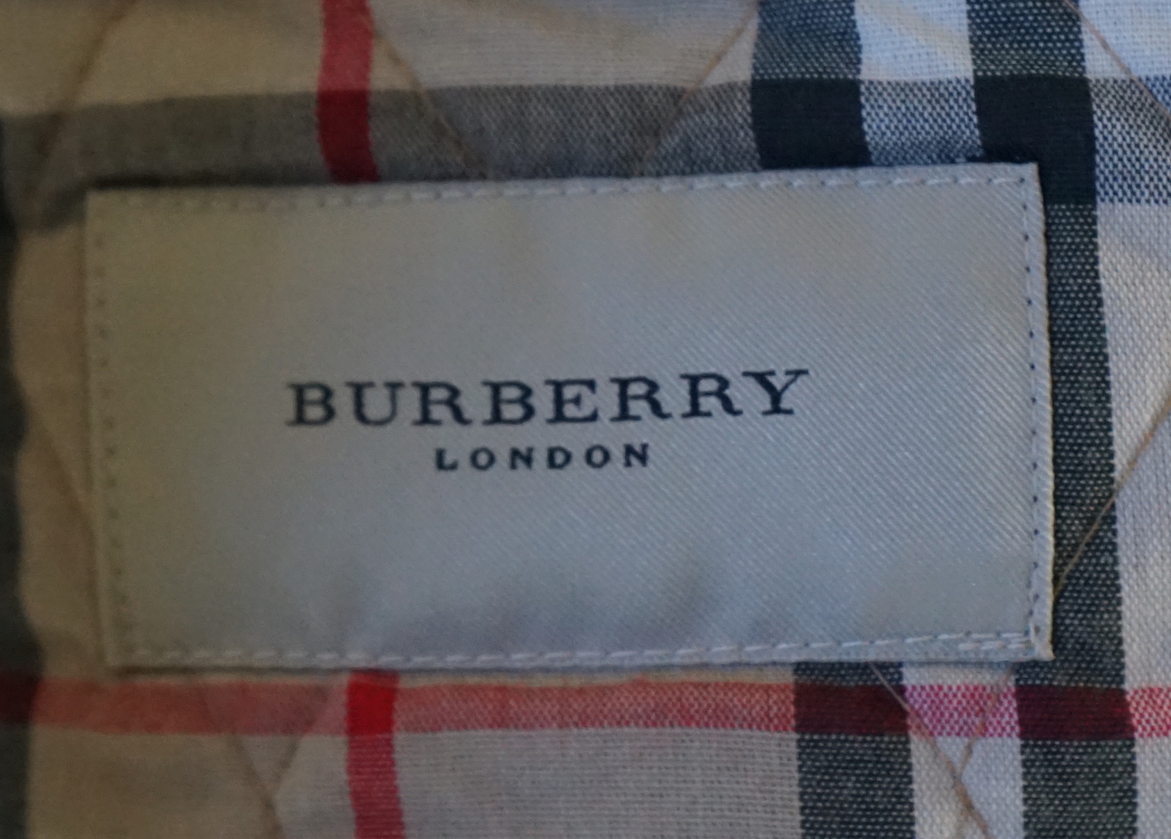Two Burberry lady's quilted jackets, one pink and the other green, size Medium